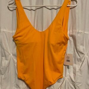 Mai Underwear Bodysuit / Swimsuit in a vibrant orange color. New with tags.